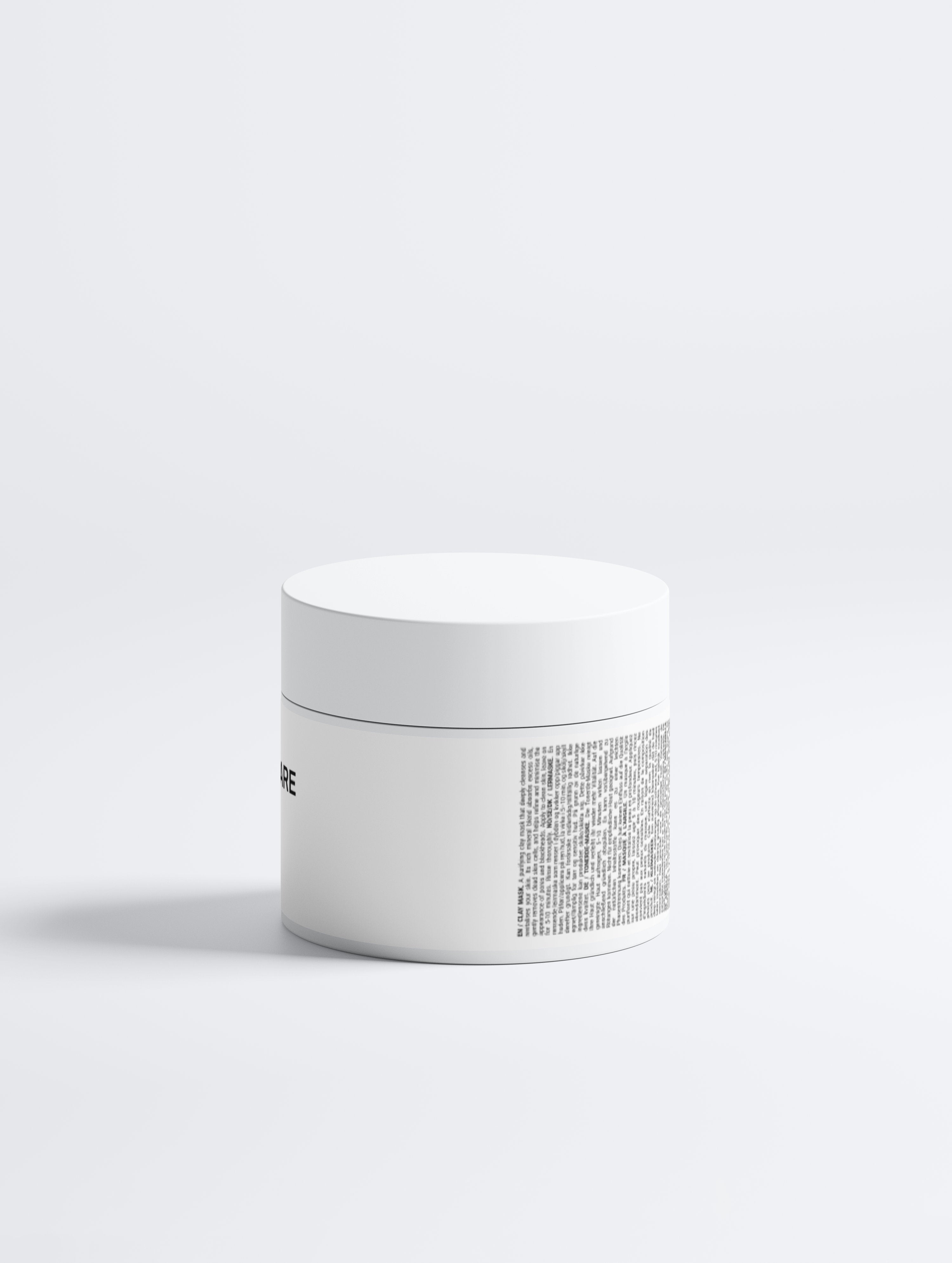 White jar with textured lid on a white background